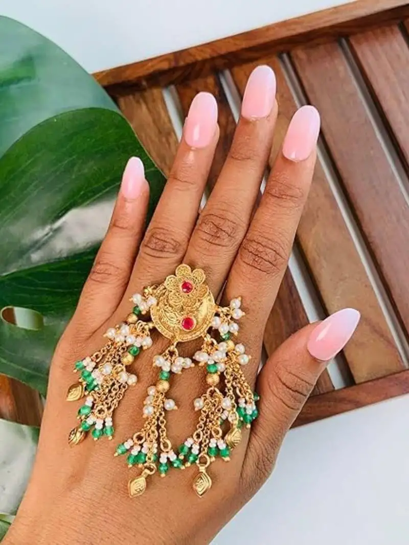 Gold plated brass adjustable finger ring with traditional design & multi chain detailing for women