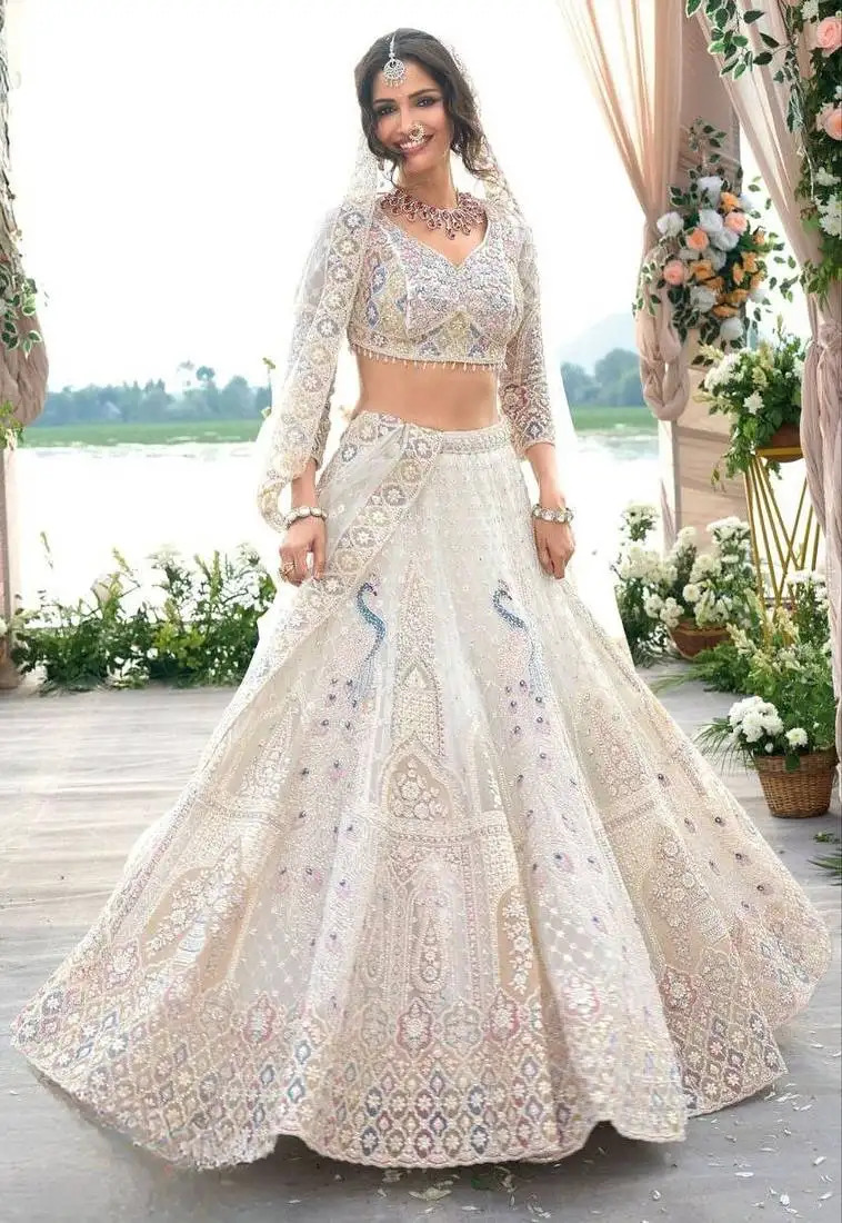 Cream embroidererd net lehenga set with dupatta