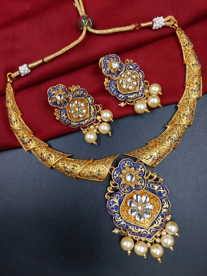 antique gold plated blue & gold meenakari necklace set with pearl drops.