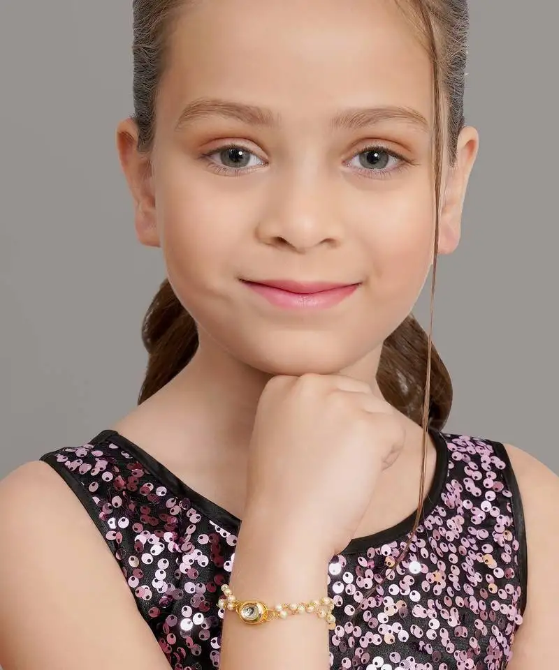 Girls gold-plated kundan studded link bracelet