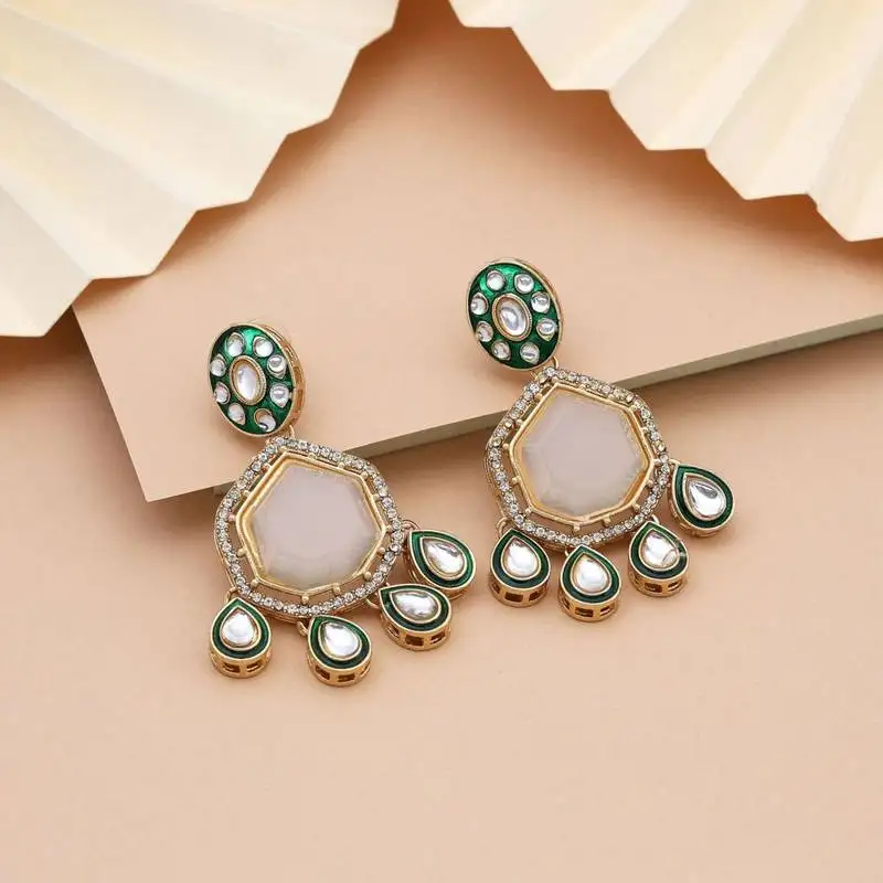 White color kundan earrings