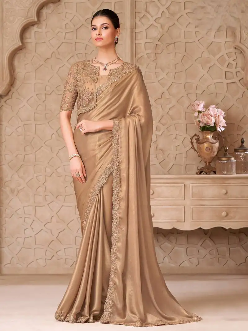 Gold shimmer satin georgette saree with jacket blouse