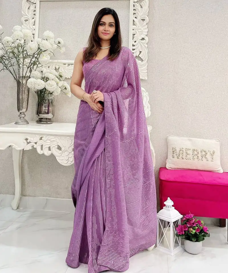 Lavender heavy sequance embroidery work georgette saree with blouse piece