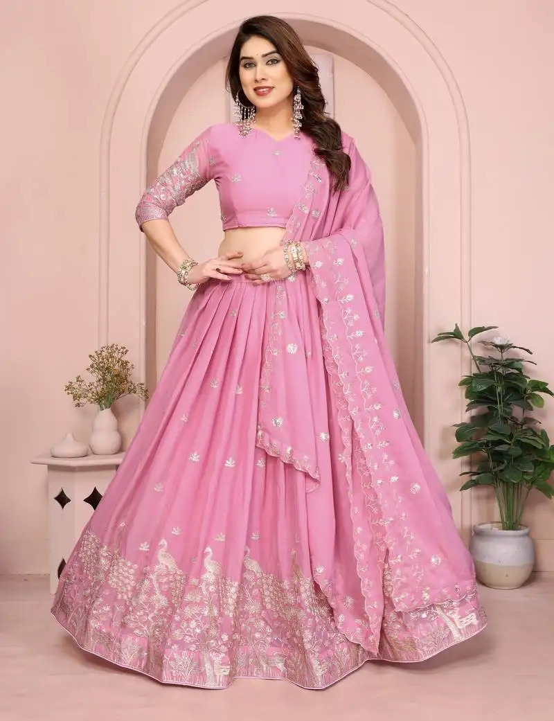 Mesmerizing baby-pink sequins and thread embroidered star georgette indian designer lehenga choli dress