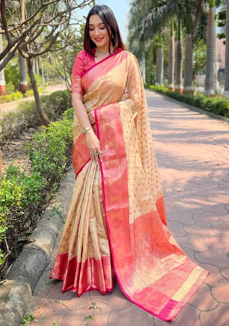 Chiku woven designer tissue silk saree with blouse piece