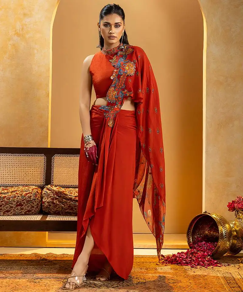 Red embroidered crepe saree