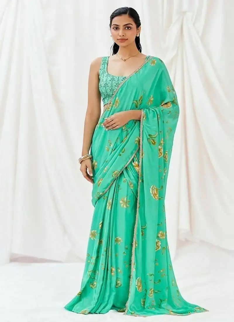 Turquoise floral printed crepe saree