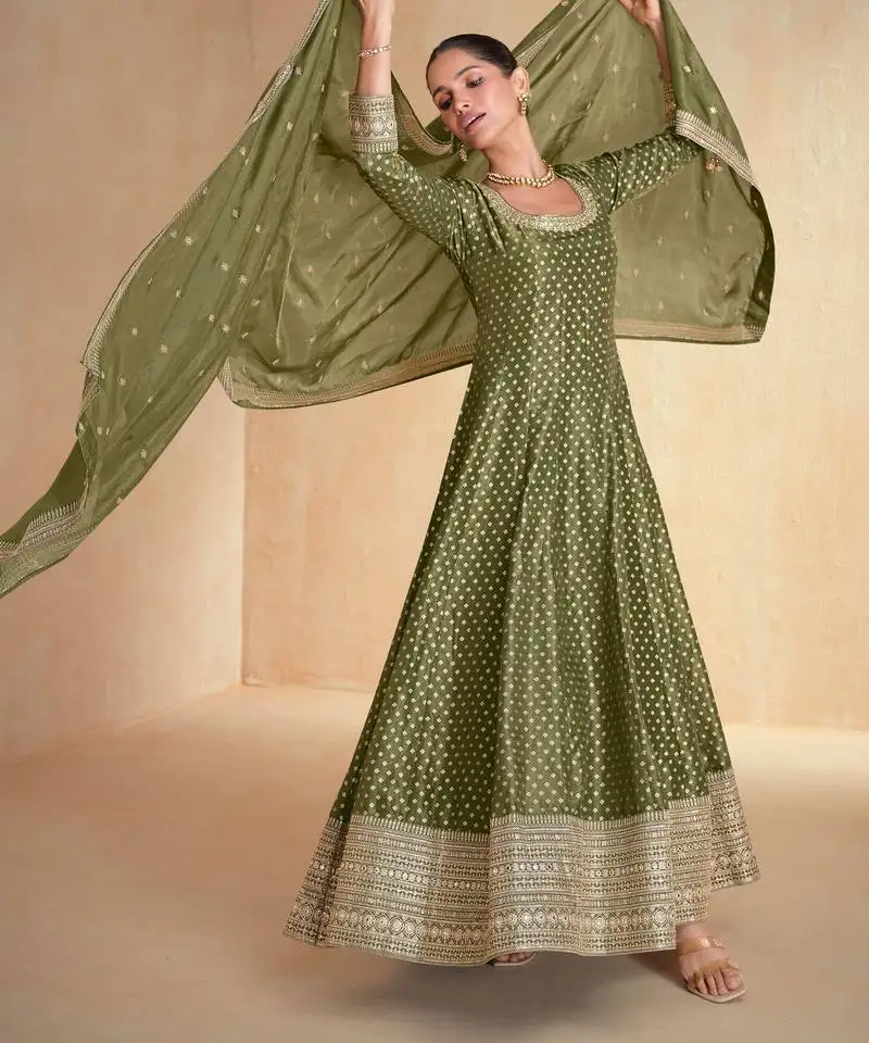 Olive embroidery , sequins , mirror & woven design work jacquard silk gown - free size stitching (size upto 42") stitched