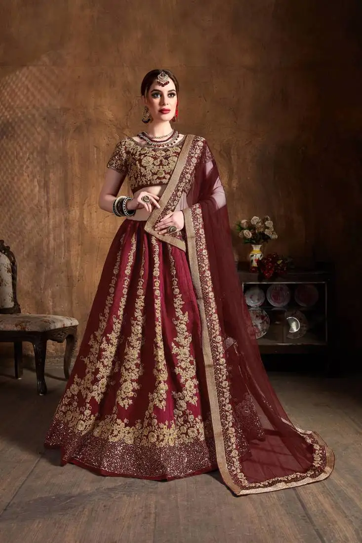 Adorning maroon embroidered art silk wedding designer lehenga choli with dupatta