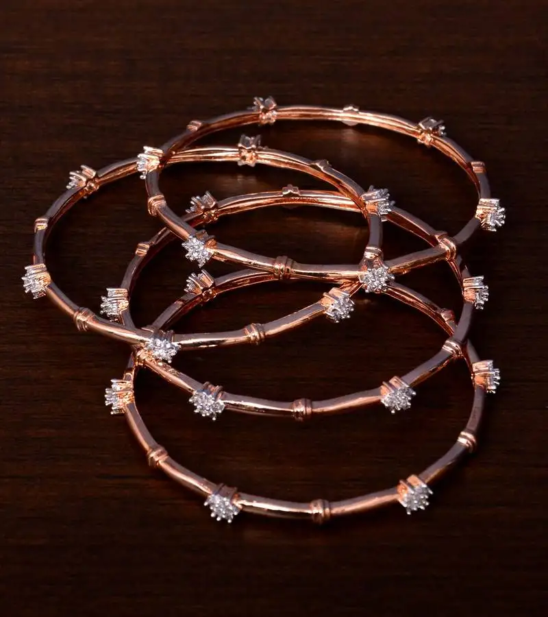 Rose gold plated aaa cz embellished two pairs of designer bangles bd426