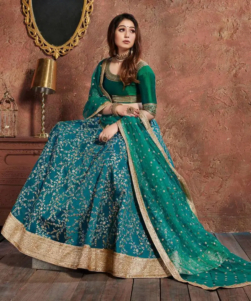 Turquoise embroidered silk semi stitched lehenga