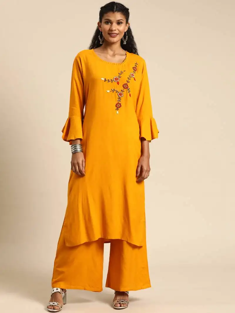 Women mustard solid kurta with plazzo with hand work detailing