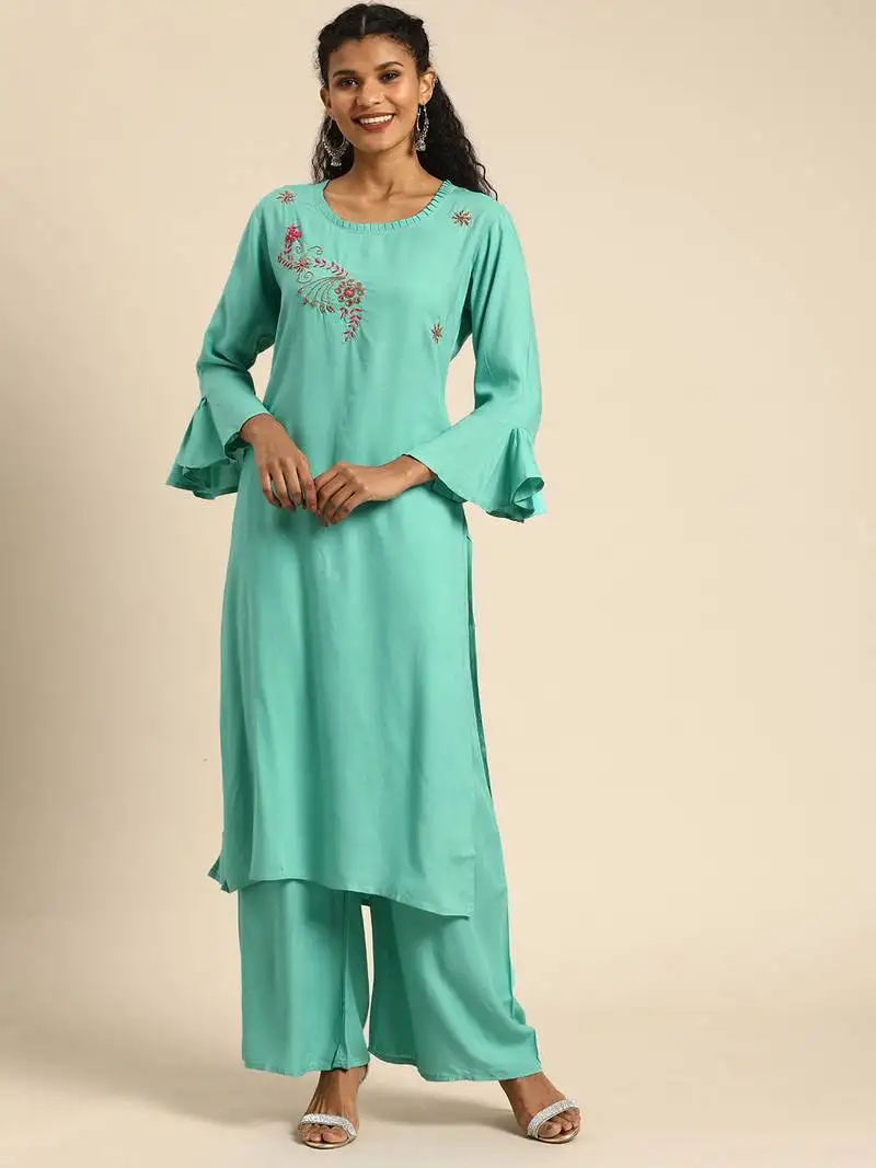 Women turquoise blue solid kurta with plazzo with hand work detailing