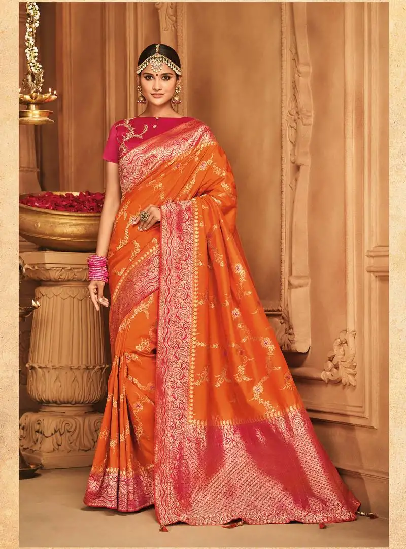 Orange woven silk blend saree with blouse