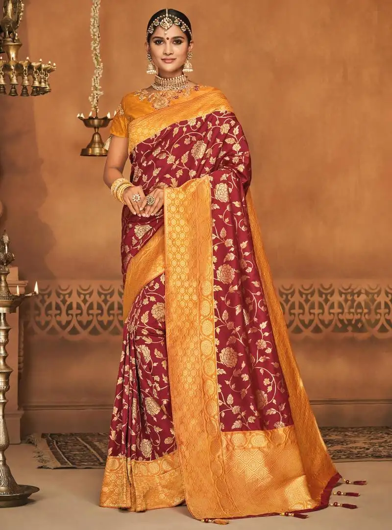 Maroon woven silk blend saree with blouse