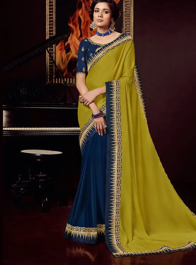 Yellow embroidered silk blend saree with blouse