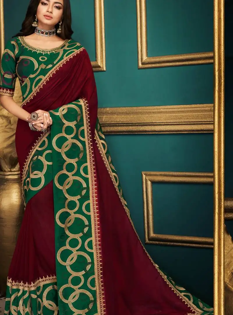 Maroon embroidered silk blend saree with blouse