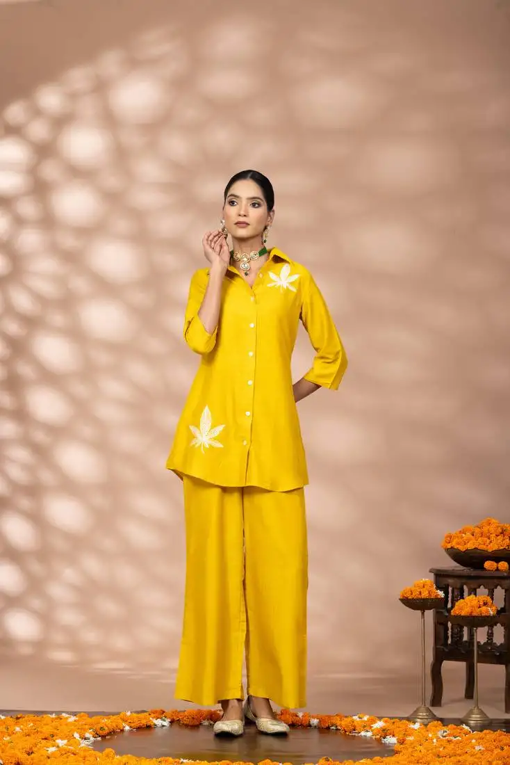 Women solid yellow leaf embroidery co-ord set
