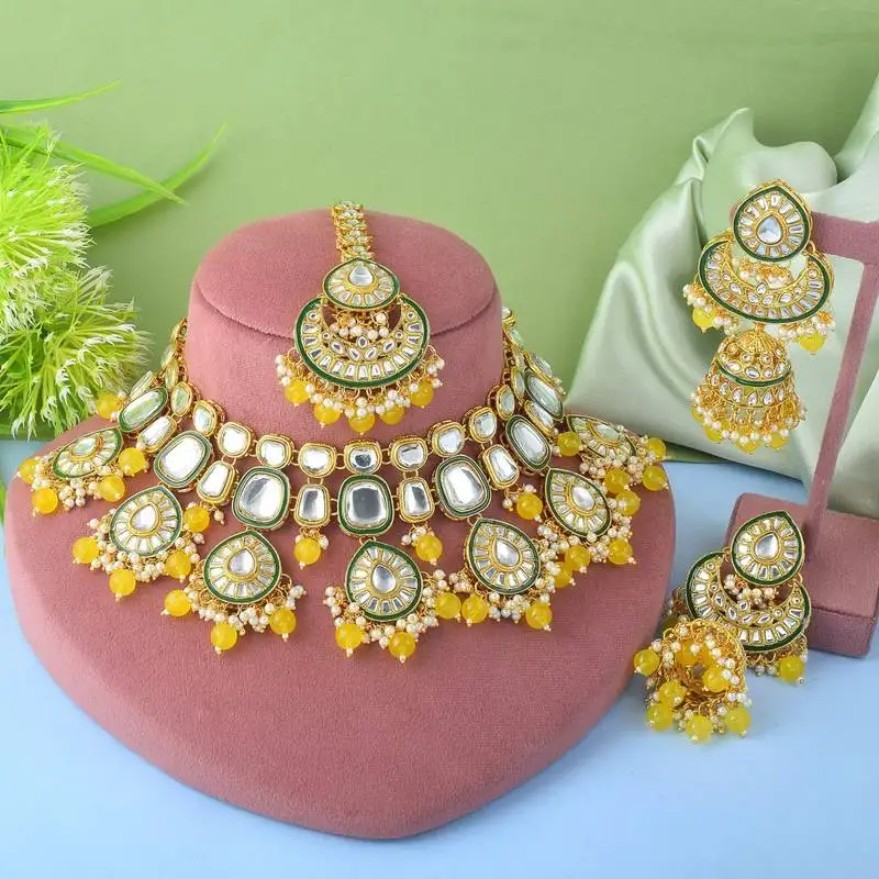 Bright yellow color kundan necklace set with royal indian design