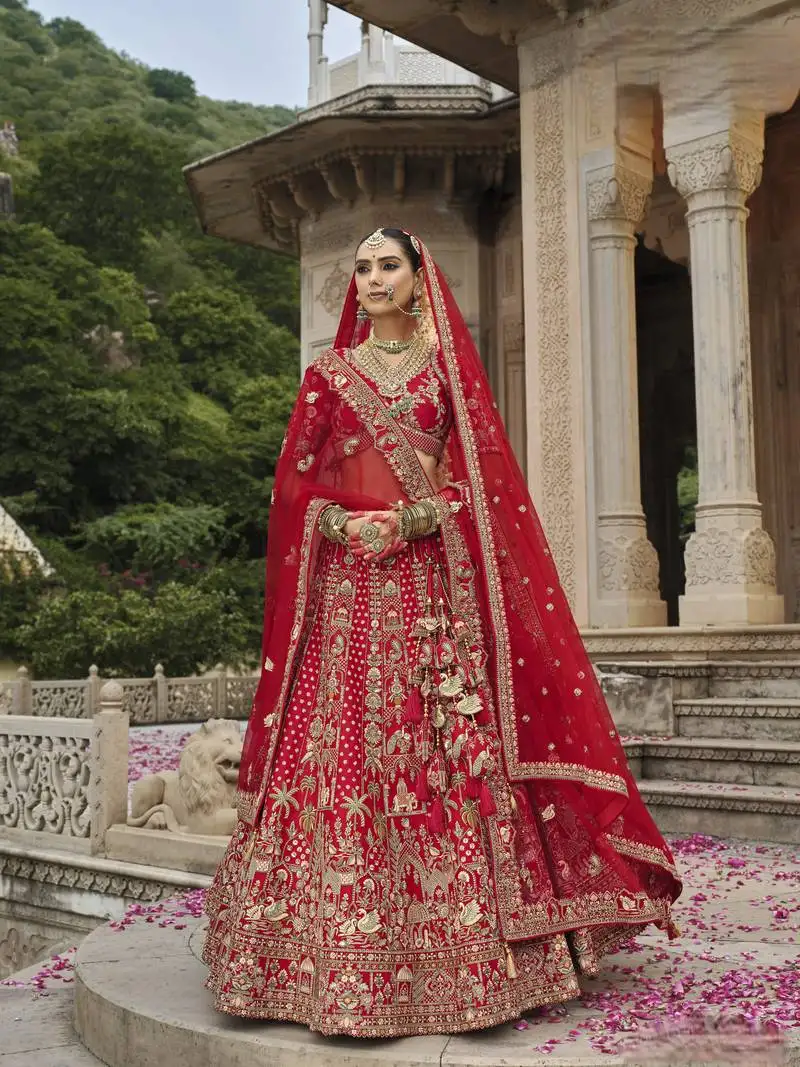 Red premium silk bridal lehenga with hand embroidery & zarkan work for wedding