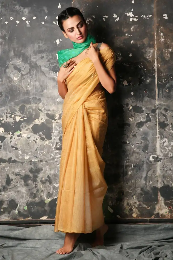 Yellow woven silk blend saree with blouse