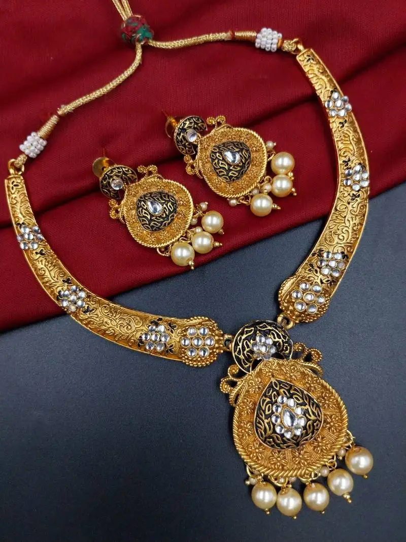 antique gold plated black & gold kundan meenakari necklace set with pearl drops.