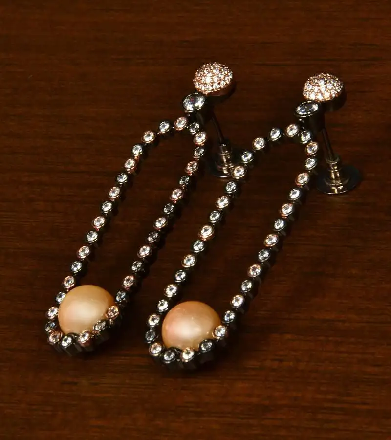 Black and rose gold plated pearl and american diamond embellished dangler 216ed350
