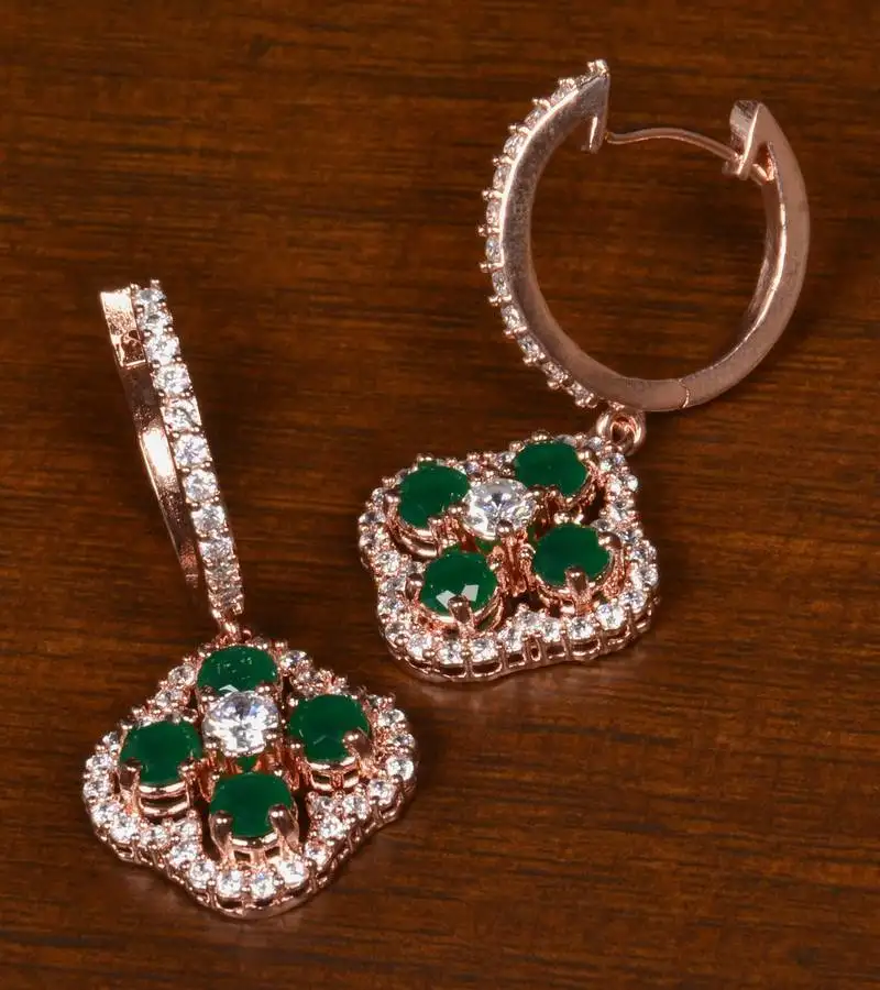 Rose gold plated american diamond and emerald embellished danglers 216ed392
