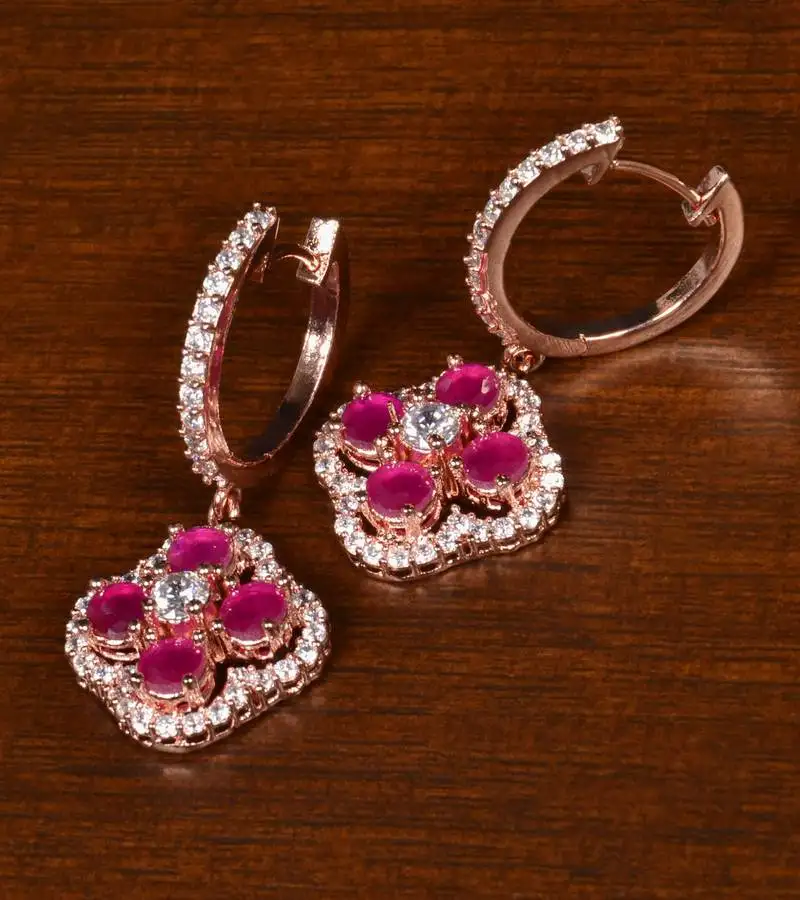 Rose gold plated american diamond and ruby embellished danglers 216ed395