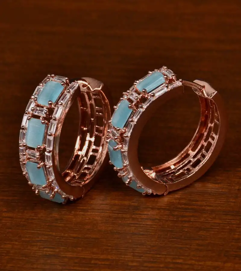 Rose gold plated american diamond and sky stone embellished designer hoops 216ed404
