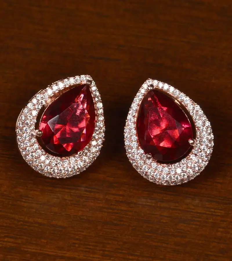 Rose gold plated american diamond and red stone embellished stud 216ed419