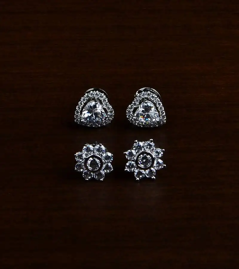 Rhodium plated two pairs of american diamons studs 216ed420