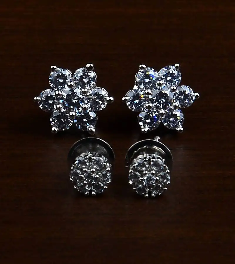 Rhodium plated two pairs of american diamons studs 216ed426