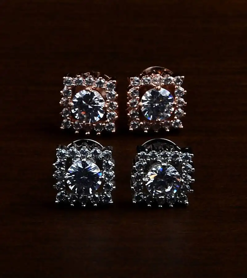 Rhodium and rose plated two pairs of american diamons studs 216ed434