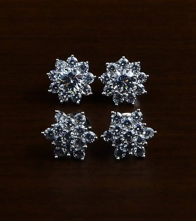 Rhodium plated two pairs of american diamond studs 216ed428