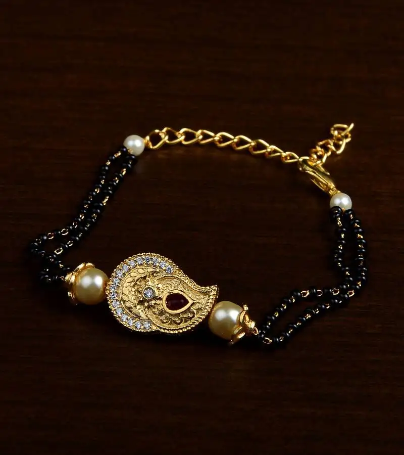 Gold plated pearl and stone embellished mangalsutra bracelet ms19