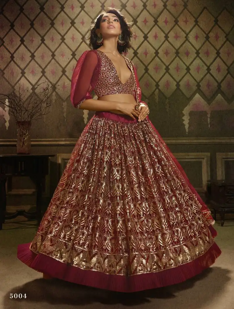 Maroon sequins embroidered net semi stitched bridal lehenga