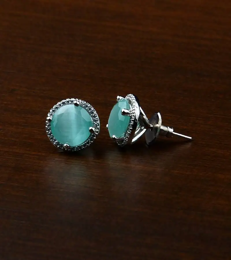 Rhodium plated mint stone embellished american diamond stud 216ed467