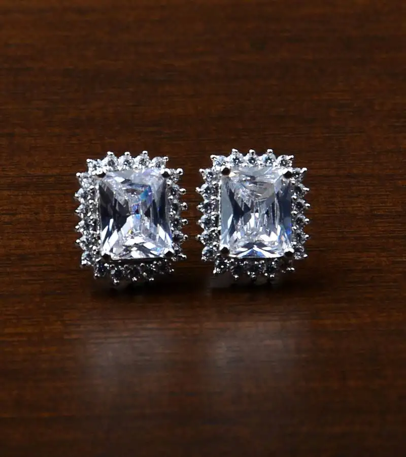 Rhodium plated white stone embellished american diamond stud 216ed456