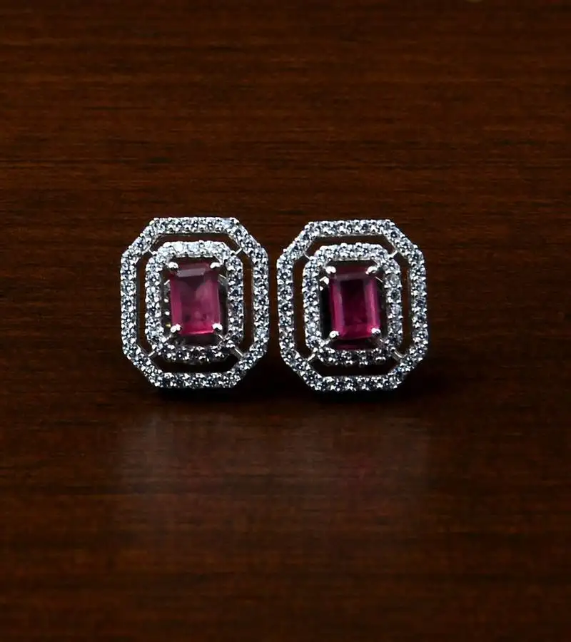 Rhodium plated magenta stone embellished american diamond stud 216ed473