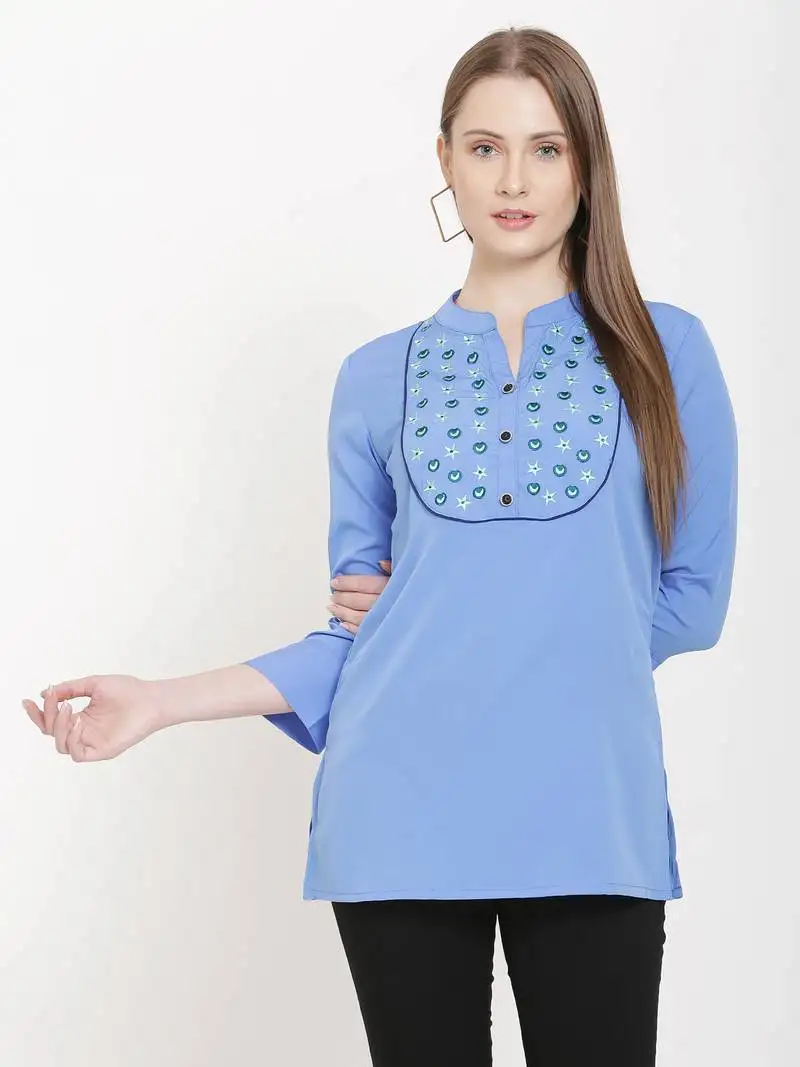 Sea-green embroidered crepe tunics