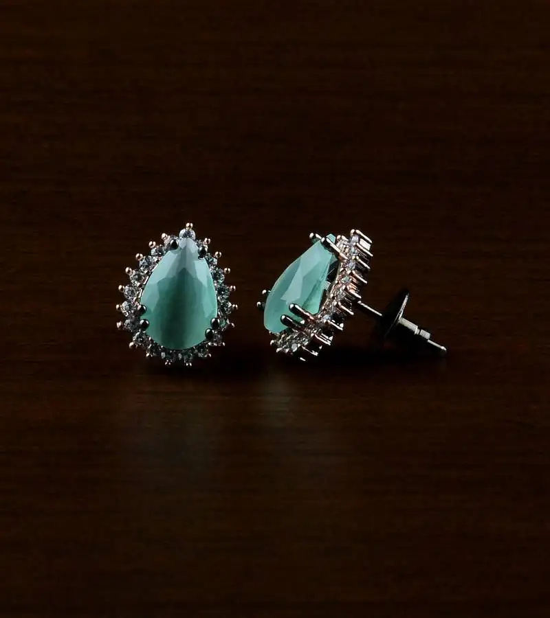 Rose and black plated mint stone embellished american diamond earrings 216ed483