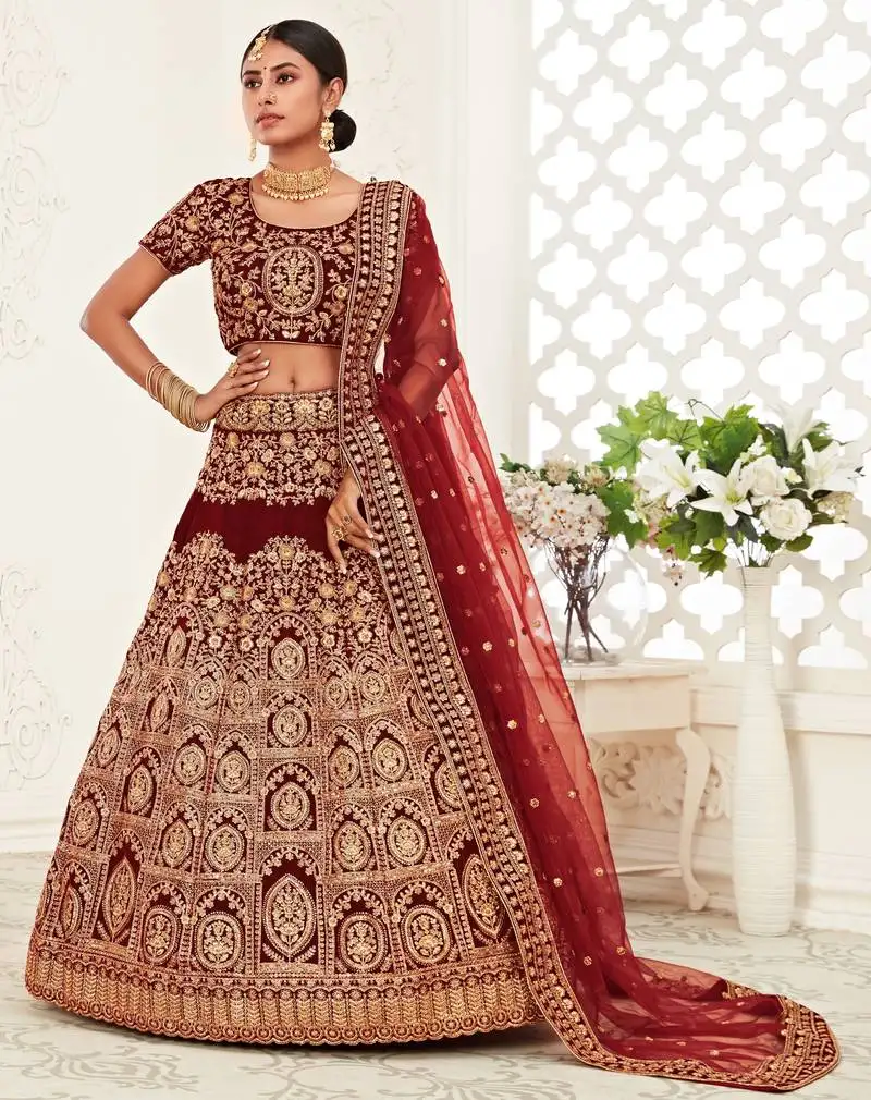 Dark red zari sequins and thread embroidered velvet lehenga choli for wedding