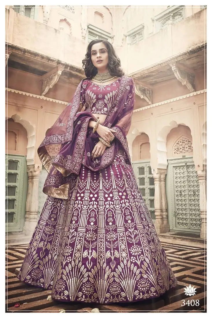 Wine colored thread and zari embroidered with pure gota work art-silk lehenga choli for bride