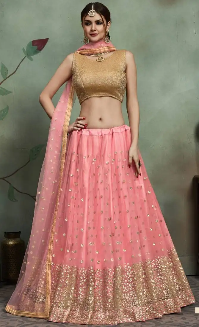 Mesmerizing baby pink thread and sequins embroidered net fabric lehenga for sangeet ceremony