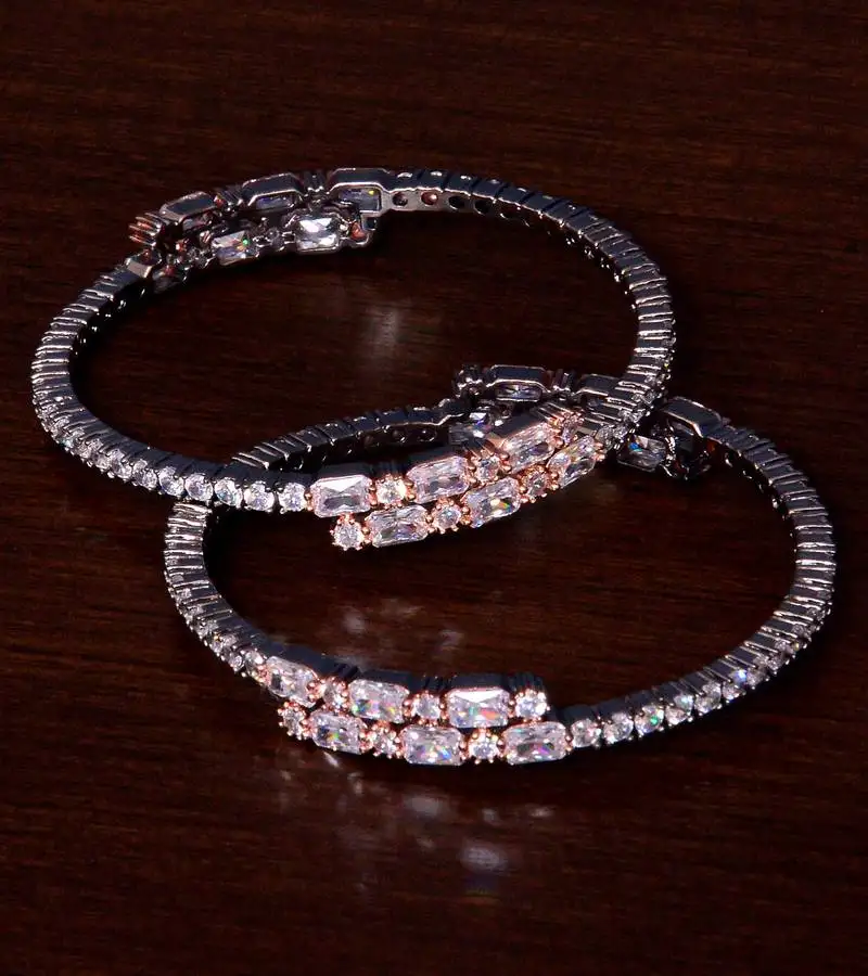 Black cum rose gold plated aaa cz stone embellished designer bangles bd401