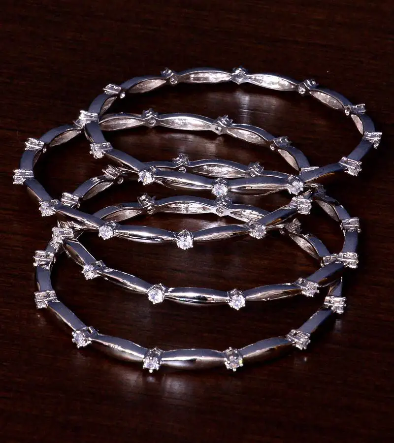 Rhodium plated aaa cz stone embellished two pairs of designer bangles bd405