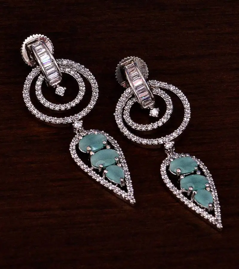 Rhodium plated mint stone embellished american diamond danglers 216ed277