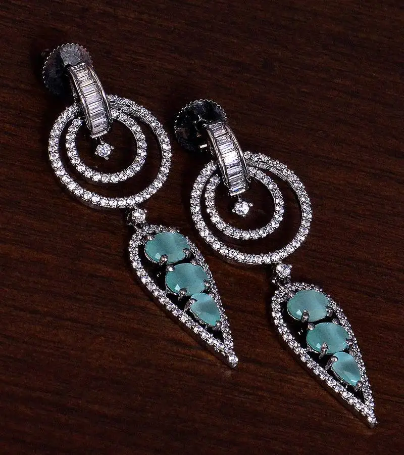 Black gold plated mint stone embellished american diamond danglers 216ed282