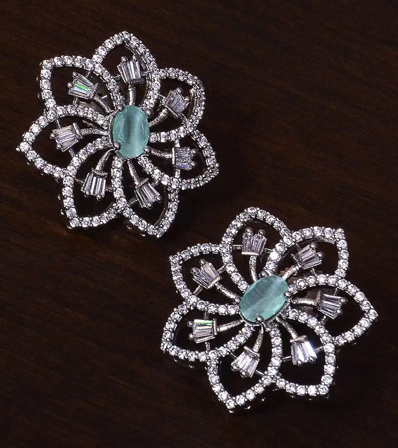 Mint stone embellished rhodium plated american diamond earrings 216ed300